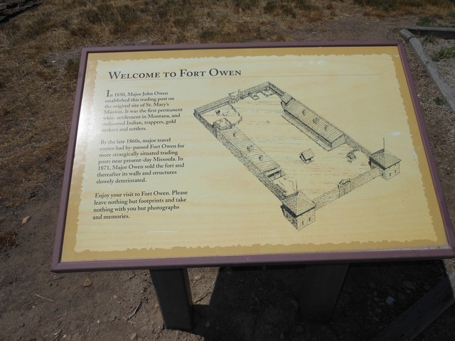 picture showing One of many interpretive signs located at various spots within the historic site.  Access to most of them are across the natural ground surface, others are along a gravel pathway. 