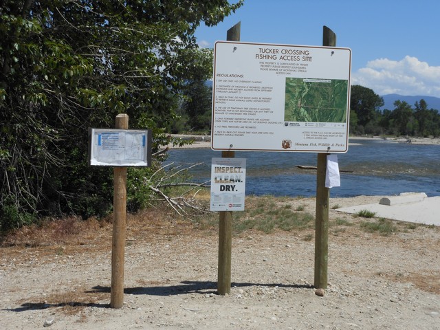 picture showing Map sign of Tucker Crossing.  Parking pad off to the right.