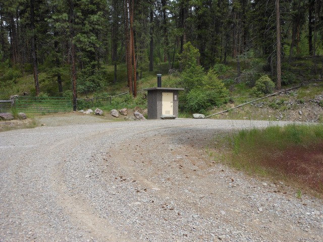 picture showing This latrine is located .2 of a mile away in the first parking area above the ramp.  