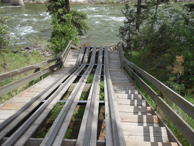 picture showing View from top of raft slide with a slope of 21.3%.  Two sets of steps, first set has 26 steps, second series has 18 steps.  This access would require assistance. 