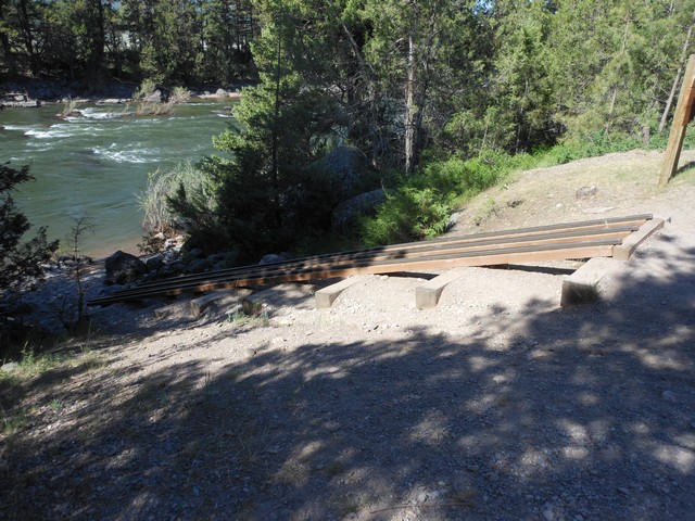 picture showing Raft slide to access the Blackfoot River.  It has a slope of 20% and is 40' long.  This is very difficult to utilize without a great support crew to assist.  Review the other photos of the slide.