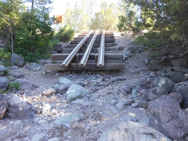 picture showing View of the raft slide looking up.  Notice the rocky shoreline.