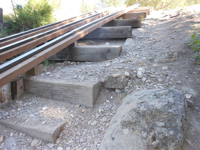 picture showing Great view of erosion & rocks along side the raft slide.  Good support crew to provide assistance is needed.