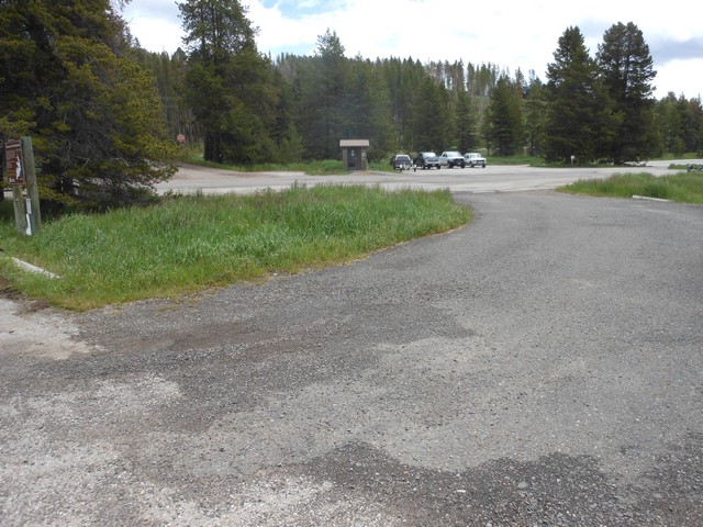 picture showing Latrine & large parking area.