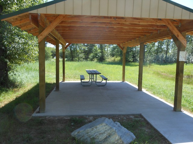 picture showing Picnic shelter not too far from the lake.