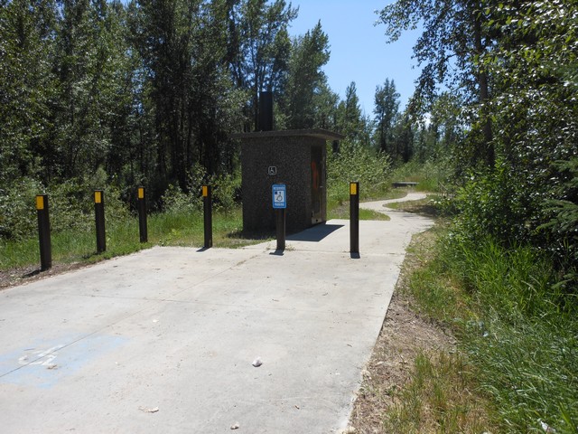 picture showing Parking pad, latrine and sidewalk to fishing platform on the east side of the river.