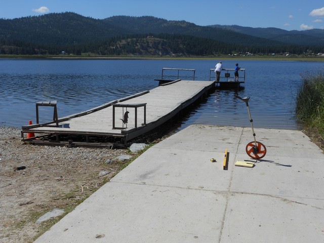 picture showing Concrete boat ramp and floating dock.  As you can see by the photo, the dock itself creates a 14