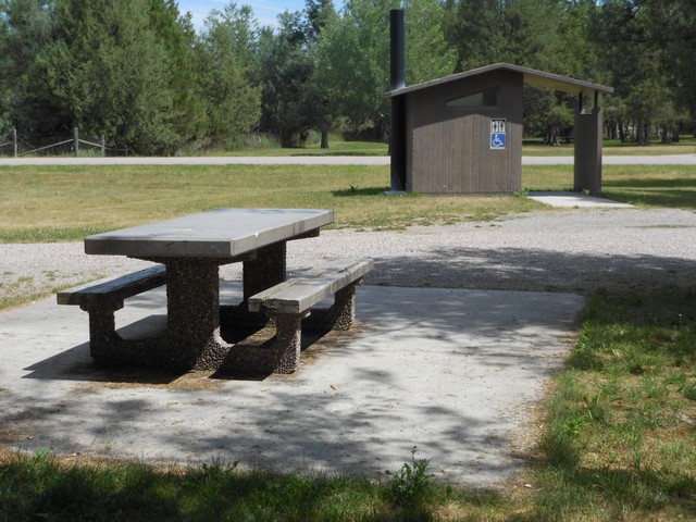 picture showing Nice accessible picnic site with table and latrine nearby.  This is the only picnic site that is actually signed accessible but there are a couple of other sites that have accessible tables.