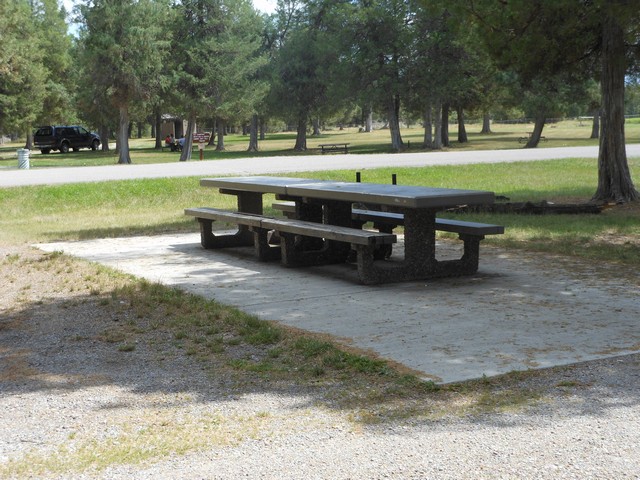 picture showing Other accessible tables within the picnic grounds.  The latrine is 153' away with a max slope of 3.7 % and cross at 2.7%.  Even though this isn't signed accessible it does meet the standards.