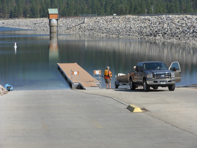 picture showing Nice boat ramp/launch with dock.  The ramp itself has a max slope of 11%. The dock does not have a bull rail.