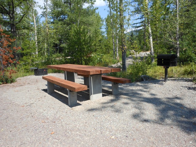 picture showing This is typical of the four picnic sites located in the day-use area.  Nice new tables & grills.