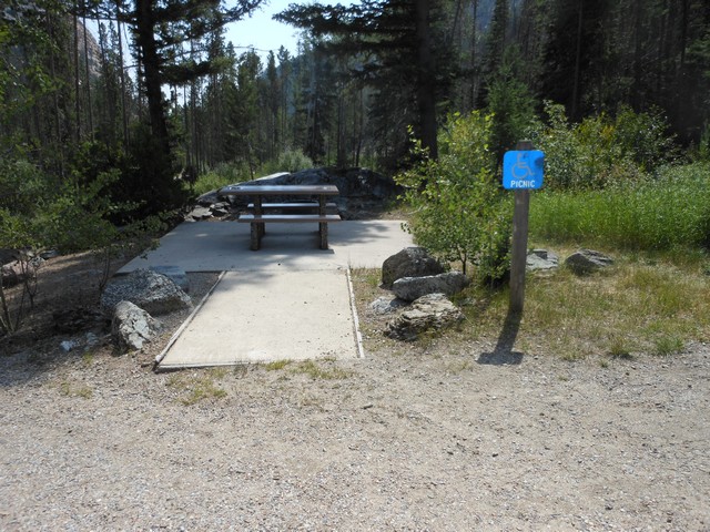 picture showing This accessible picnic site is located adjacent to the trail-head parking lot to the Lost Creek Falls.