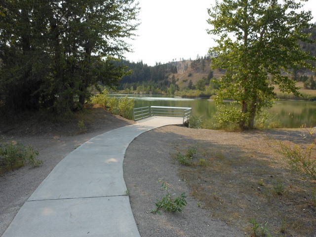 picture showing Concrete walkway and fishing platform at Beavertail Pond.