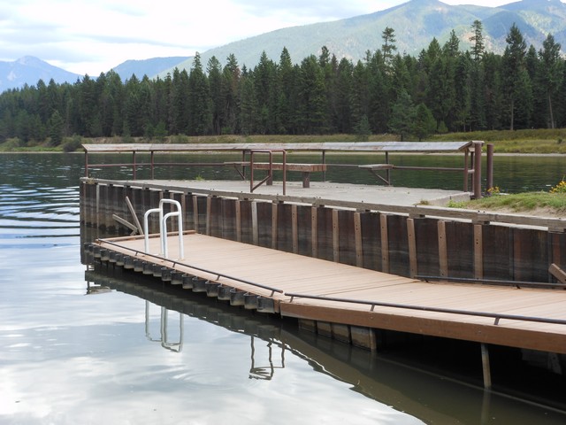 picture showing Floating dock with hand-rail to assist people in and out of boats.