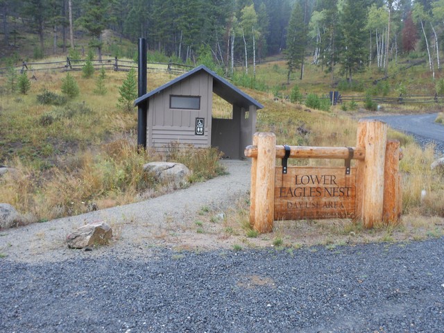 picture showing Trail head parking and accessible latrine at the Lower Eagle's Nest access point.