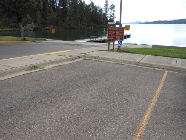 picture showing Marked accessible parking adjacent to the boat launch, although it has a running slope of 6.7%.