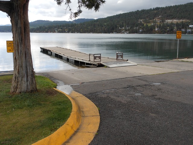picture showing Boat launch area with a double ramp and floating dock in the middle.