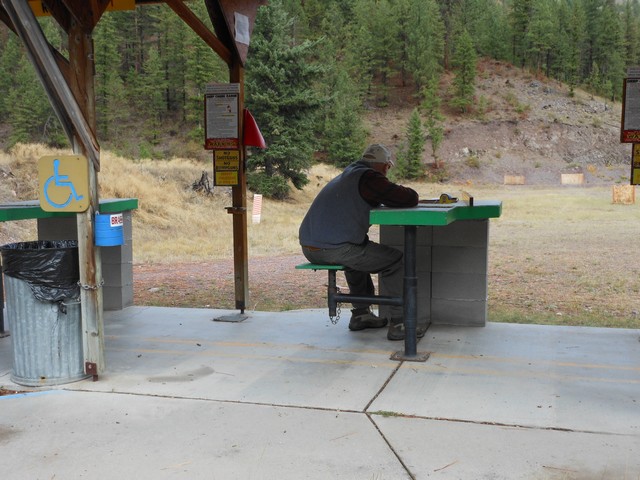 picture showing Shooter demonstrating shooting bench.