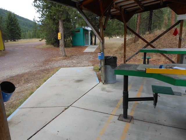 picture showing Notice accessible latrine in the background.  