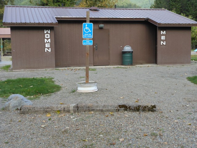 picture showing Accessible flush toilets with parking.  This is located adjacent to the large parking area and it is also the shortest route to the group picnic shelter.