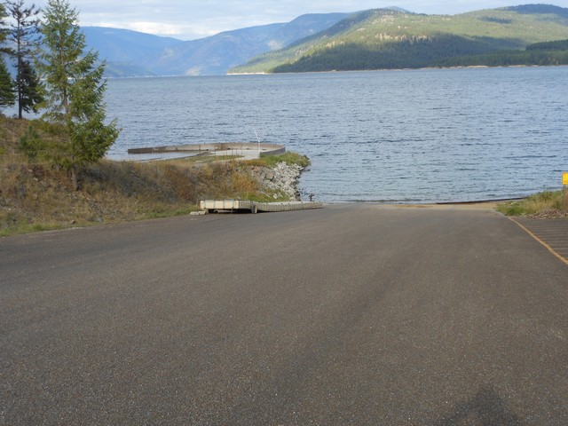 picture showing Boat launch area with two ramps and a dock.