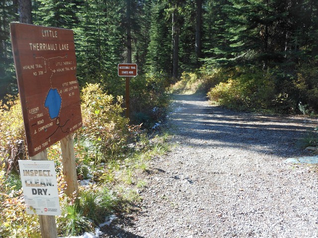 picture showing Trailhead signage to the accessible 1.5 mile trail around the lake.  