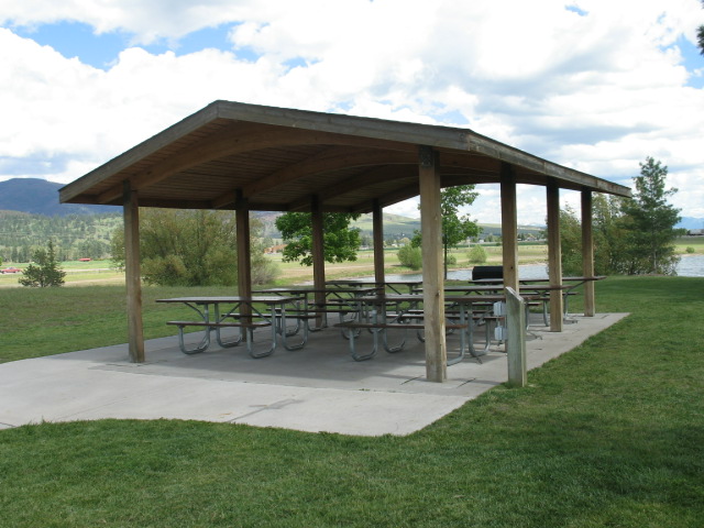 picture showing Sheltered group picnic area with accessible tables.