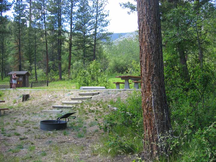 picture showing Second picnic area (which is inaccessible) at the accessible campsite at Indian Trees Campground, also shows the accessible restroom in the background.