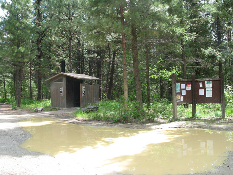 picture showing This are accessible restrooms at Kreis Pond, however the accessibility of the routes to the restrooms are dependent upon weather and seasonal conditions, as can be seen in this photo.