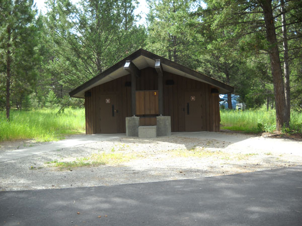 picture showing Typical restroom with flush toilets and sink.