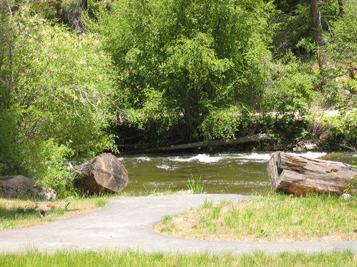 picture showing Paved path with river overlook.